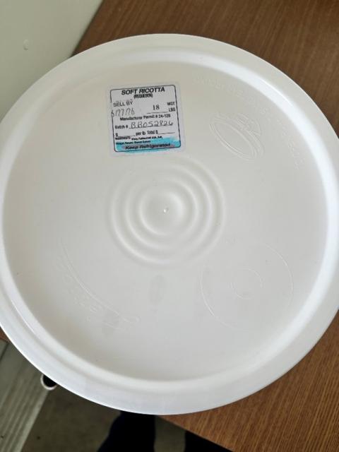 Photograph of label on white bucket of Soft Ricotta Cheese, 2 gallon recalled product/package image