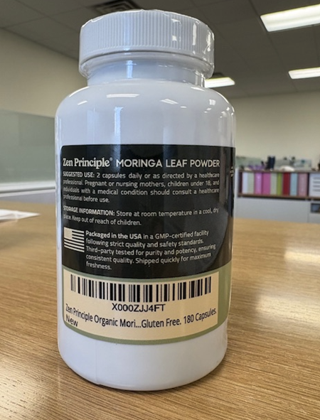 Zen Principle Moringa Leaf Powder in bottle with Amazon code X000ZJJ4FT